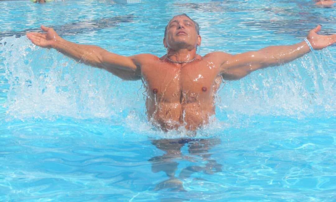 ATLAS swim coach demonstrating confident movement in the pool