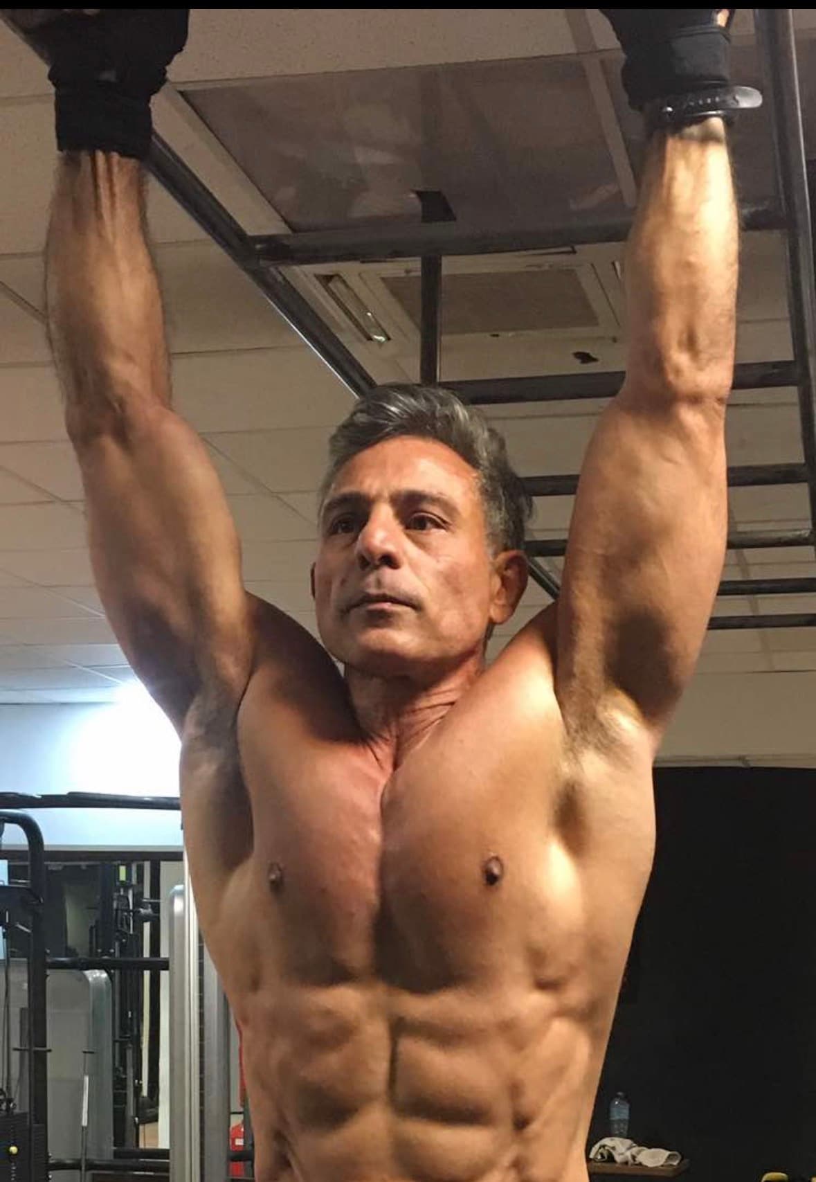ATLAS strength coach completing dumbbell training